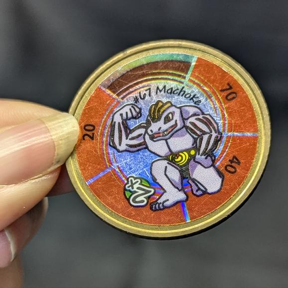 Vintage Machoke #67 Pokemon coin from the 90s, metal