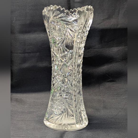 Clear bohemian crystal vase, has some chips on top