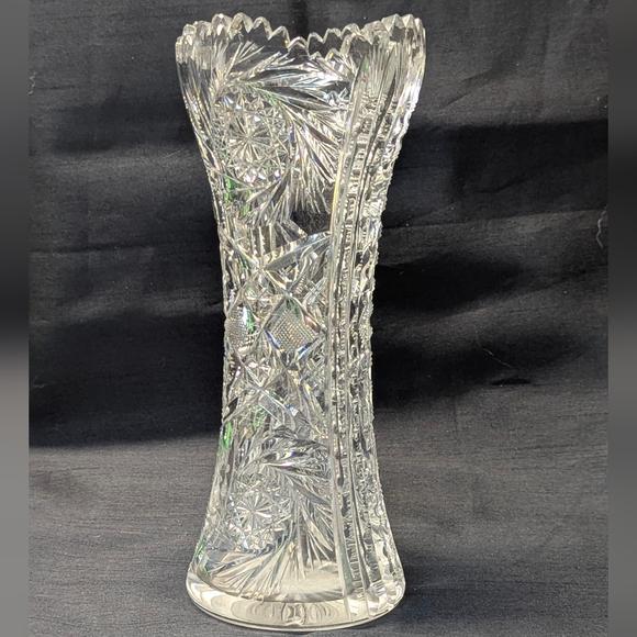 Clear bohemian crystal vase, has some chips on top