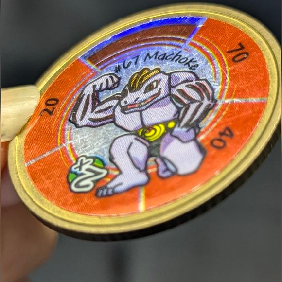 Vintage Machoke #67 Pokemon coin from the 90s, metal
