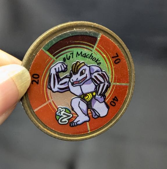 Vintage Machoke #67 Pokemon coin from the 90s, metal