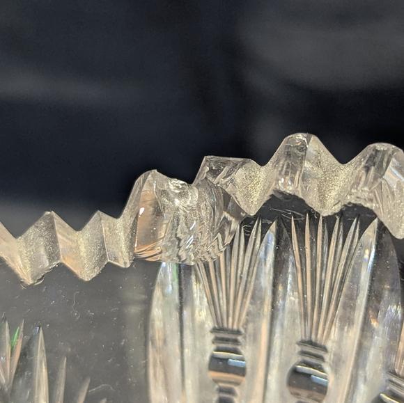 Clear bohemian crystal vase, has some chips on top